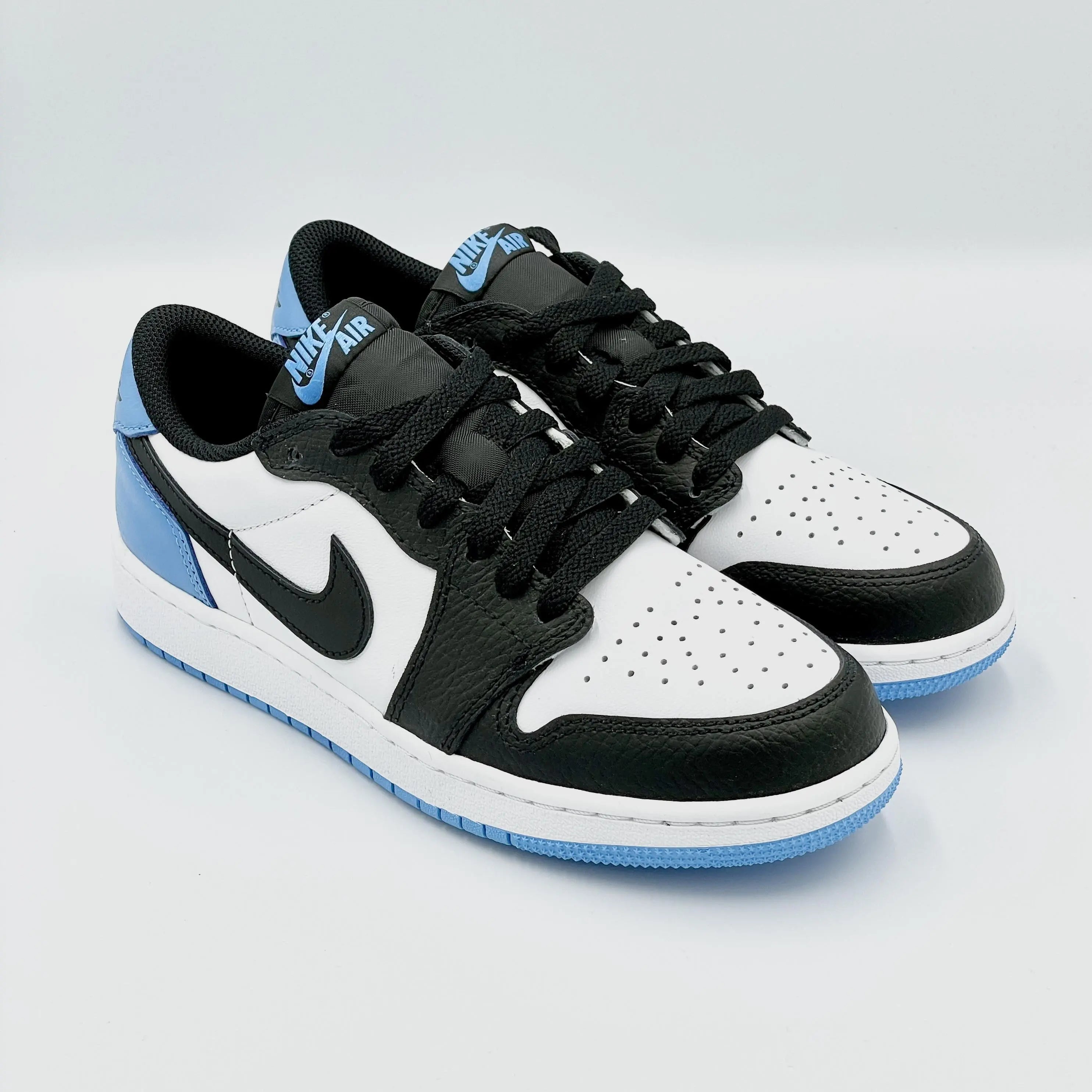 Jordan Retro Low OG Black Dark Powder Blue (GS)1