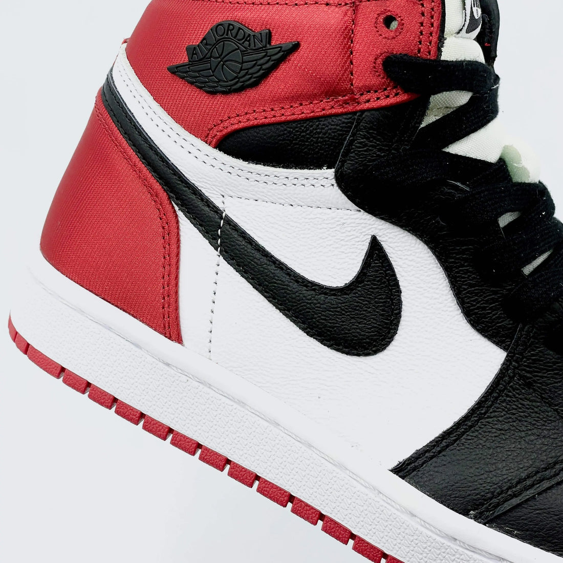 Aj1 black toe outlet satin